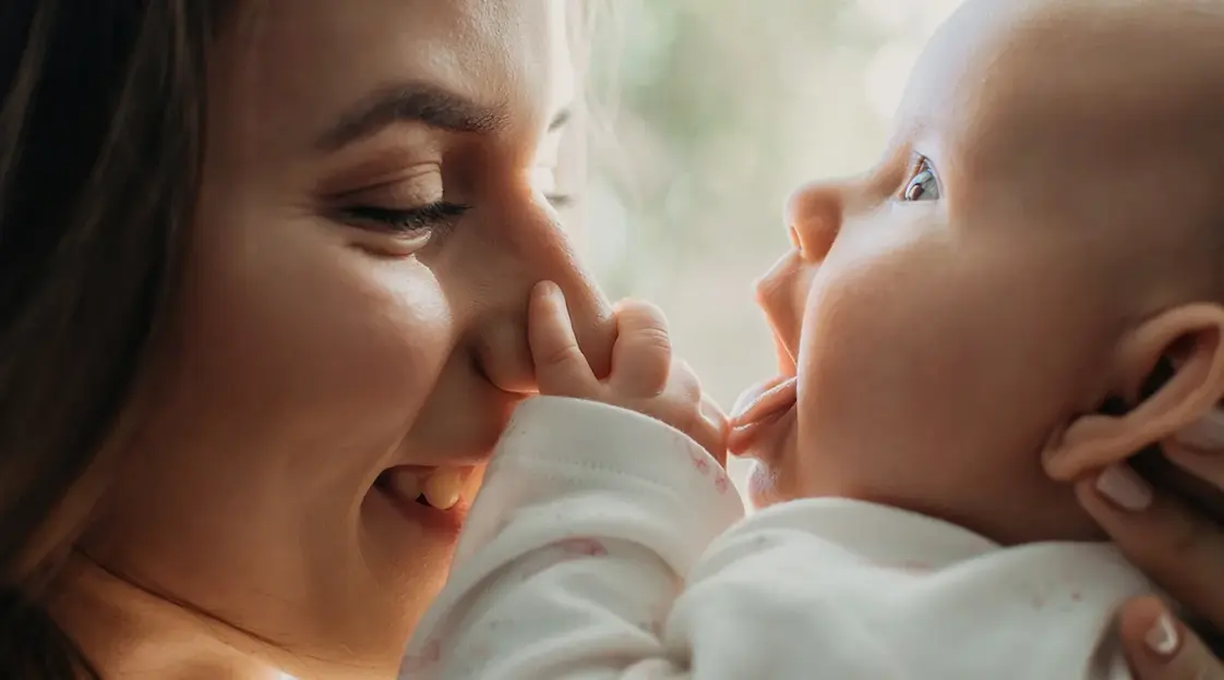 Intimate moment between mother and baby - the tender connection that Wo-health supports and nurtures