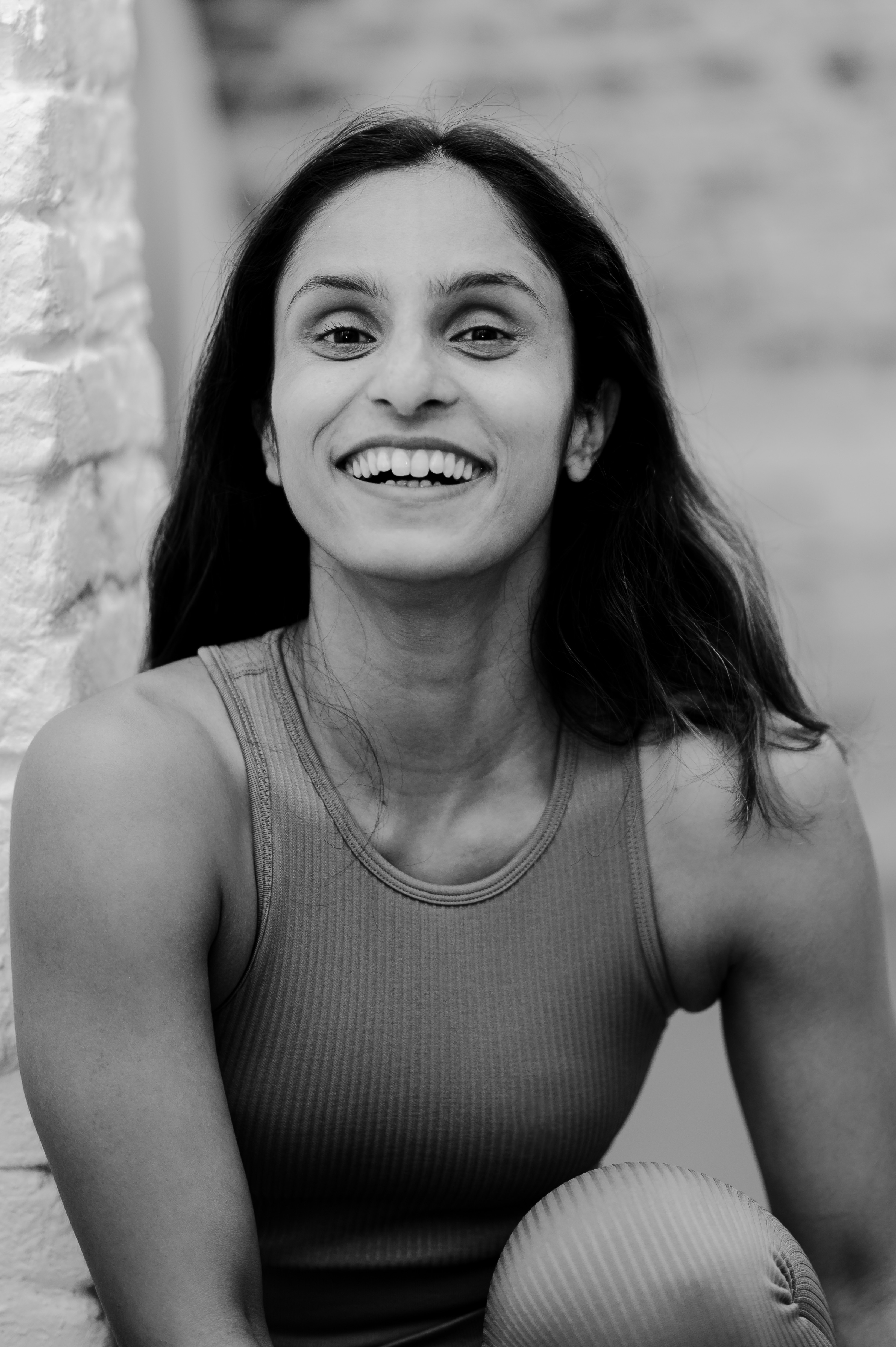 Tanu, founder of Wo-Health, smiling warmly - a mother who understands the journey